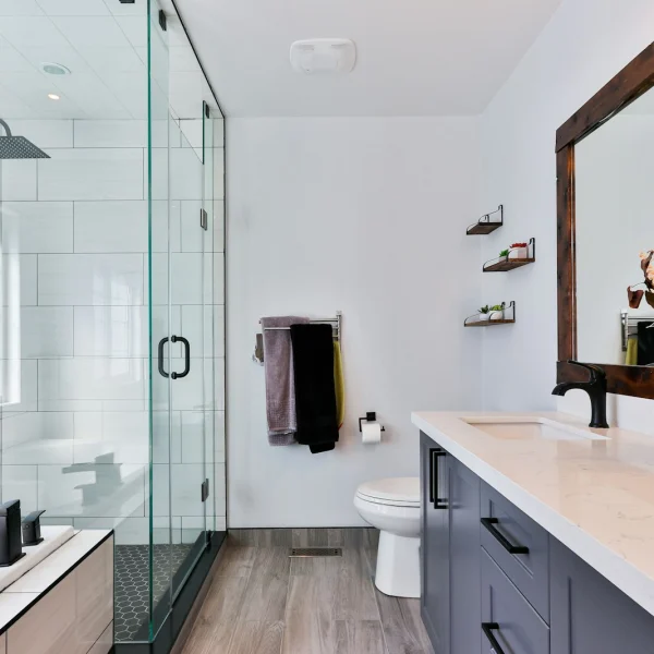 Clean modern bathroom with a glass shower and vanity